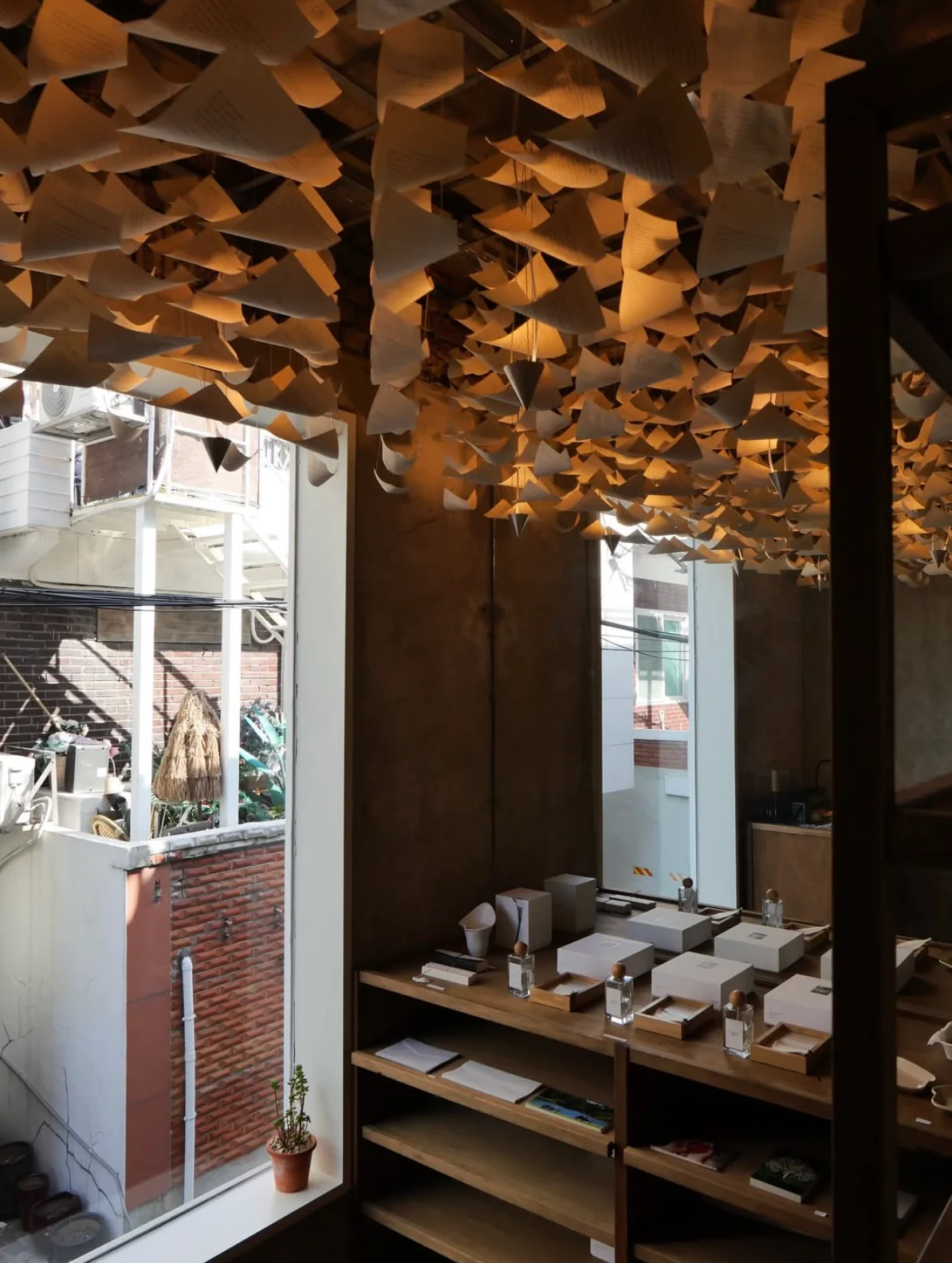 Hearts House interior - warm wood-tone seating area