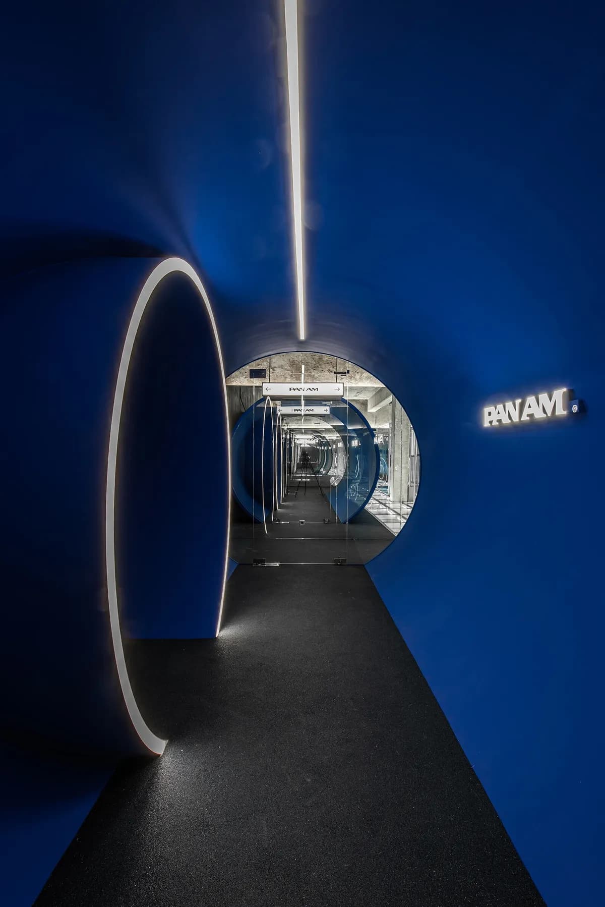 Pan Am Seongsu flagship blue circular tunnel entrance in converted factory building